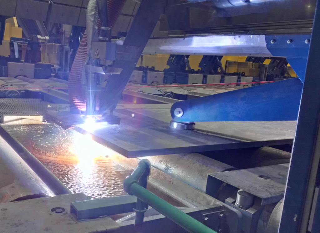 mechanized plasma cut of an extremely hot steel slab